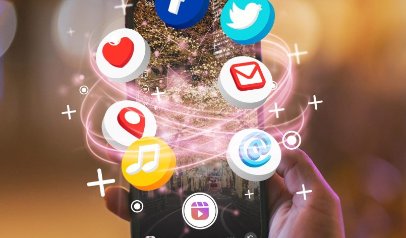 hand-holding-smartphone-social-media-concept hand-holding-smartphone-social-media-concept